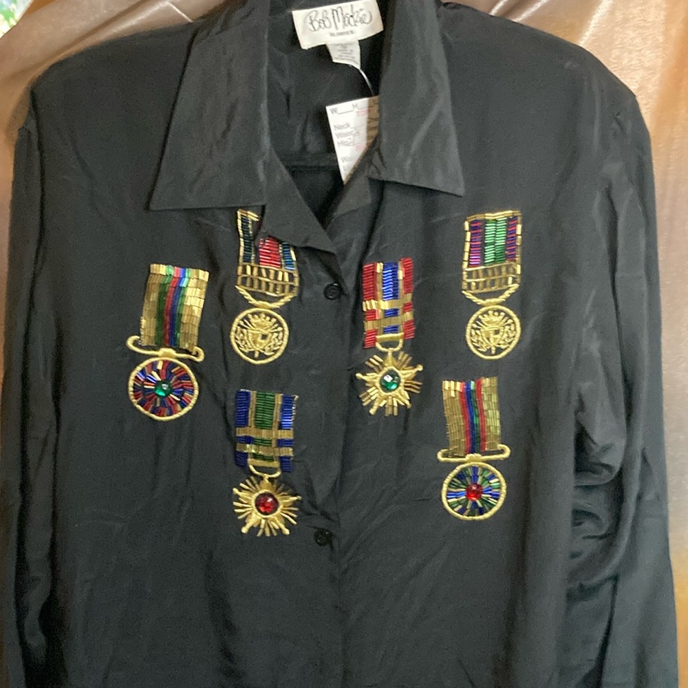 80’s vintage Bob Mackie black silk blouse with sequin medal design. 410‎